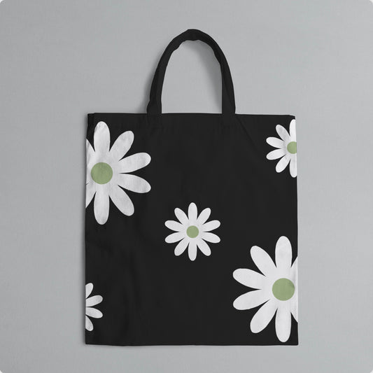 black tote bag with white flowers with gray background
